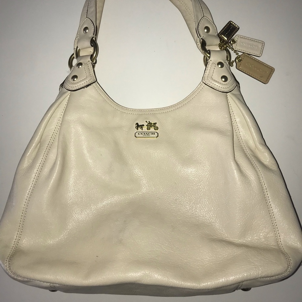 For sale: Gently used cream Coach tote